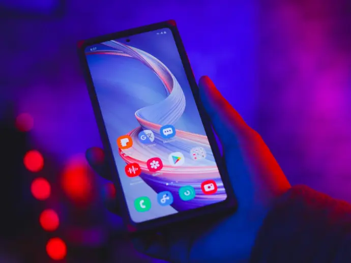 Smartphone displaying voice and messaging apps, representing post-quantum secure communication.