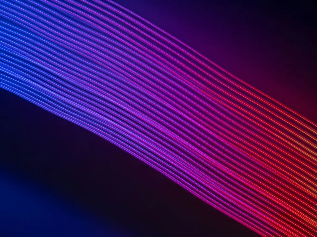 Abstract purple and red wave lines representing secure data synchronization